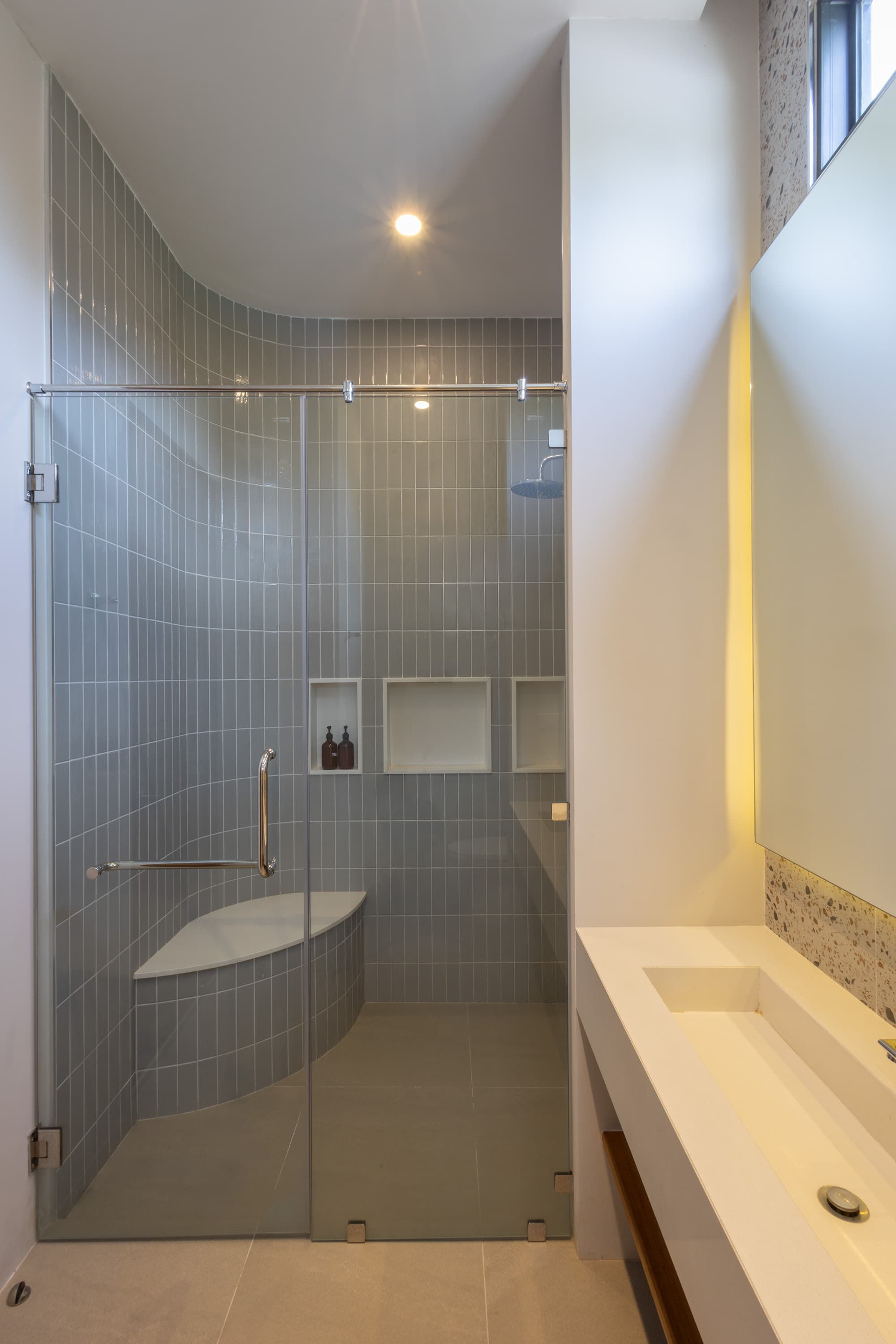 Bathroom with glass shower enclosure — Barefoot Villas