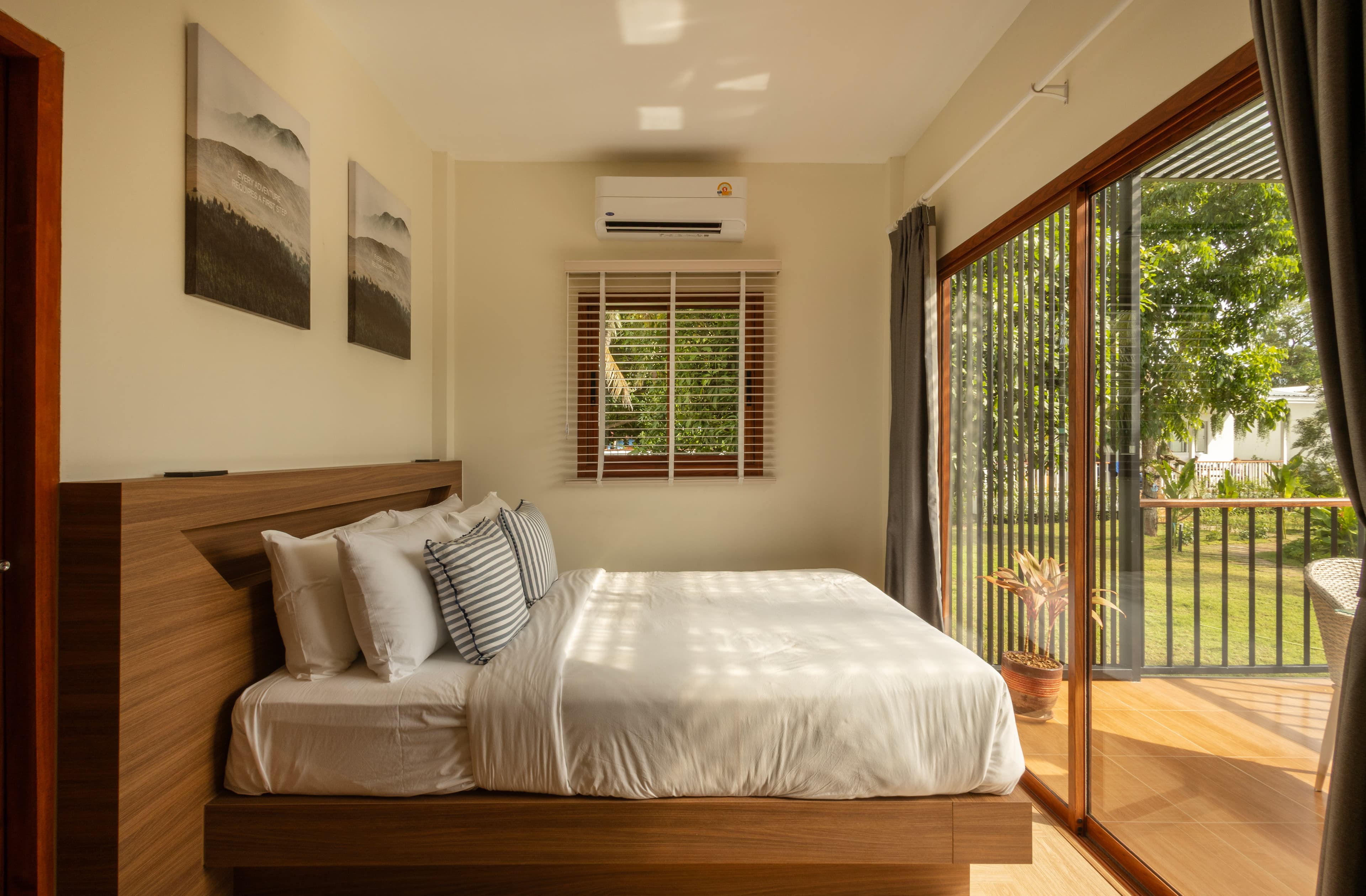 Unit entrance with pergola and frangipani garden — Caya Beach
